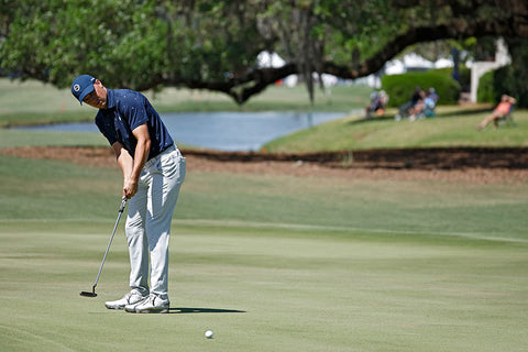 Jordan Spieth putting on the green at the RBC Heritage PGA TOUR tournament